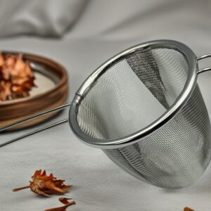 Zilveren theezeef met handsvat<br>Thee-accessoires